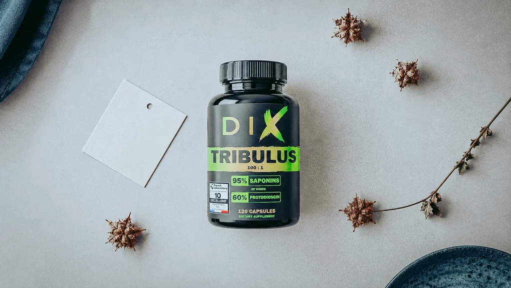 Pot de Tribulus terrestris affichant son taux de protodioscine, entouré de fruits séchés
