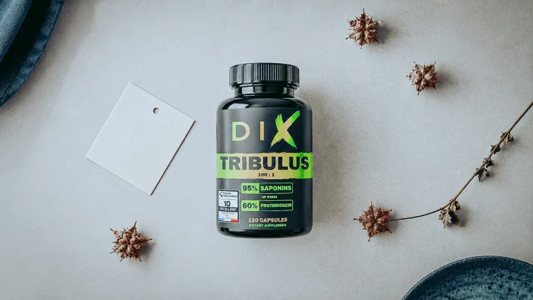 Pot de Tribulus terrestris affichant son taux de protodioscine, entouré de fruits séchés