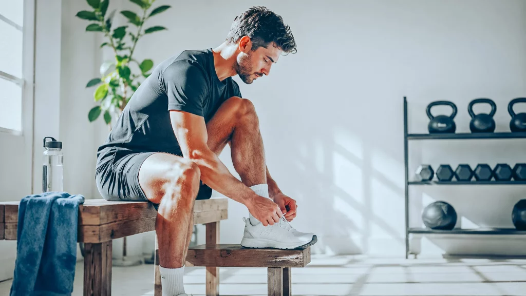 Relaxed athlete at the gym, tone and vitality perceived with Tribulus